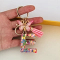 Pink resin letter E keychain with butterfly charm and colorful heart sequins - Butterfly Tassel 8-Shape Buckle / Letter E