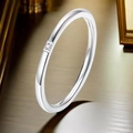 Minimalist silver stainless steel ring with a single bezel-set diamond centerpiece - US 5 / Single Stone Style (1mm) / Silver