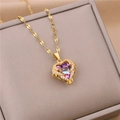 Elegant gold bow necklace with purple crystal heart pendant and sparkling rhinestones - Heart Wings Purple Gem (N1264)