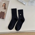 Black ribbed cotton crew socks featuring white bee embroidery on a clean lifestyle background - One Size / Black