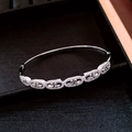 Close-up of silver-tone oval hollow bracelet with pavé rhinestones in a velvet box - 18K White Gold Plated (Silver) / Silver