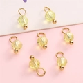 7 yellow faceted glass bead pendants with golden metal loops for DIY jewelry making - Yellow Round Bead