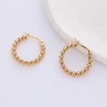 Elegant gold beaded hoop earrings in minimalist style shown on a natural stone base - 20mm / Gold