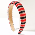 Detailed view of red, black and silver beaded sponge headband with soft velvet inner lining - Red Black Brown