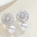 Elegant silver flower earrings featuring sparkling zircons and a white pearl drop - Sunflower Pearl Dangle Earrings / Silver