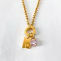 Elegant 14K gold plated stainless steel necklace featuring letter P and pink stone - Letter P
