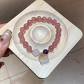 Macro shot of moonstone and strawberry quartz beaded bracelet with a jade-like pendant - 37# Bracelet