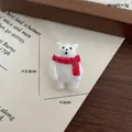 Sparkly white resin polar bear Christmas accessory with red scarf, size 2.6cm by 2cm - Polar Bear