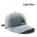 Light blue denim baseball cap with vintage red W embroidery and adjustable strap - Light Blue