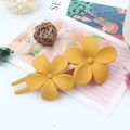 Matte yellow double flower U-shaped hair clip for women featuring elegant floral design - Yellow