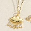 Cloud pendant necklace with lightning and pear-cut zircon rain drops in golden finish - Cloud