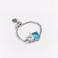 Adjustable silver chain ring with emerald cut blue stone and pear shaped white zircon - Sea Blue + White Zircon - Platinum