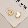 Detailed macro view of 12mm gold plated heart pendants for DIY jewelry making - 1# Heart Embossed