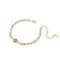 Bracelet tennis en acier doré avec pierre hexagonale verte et cristaux de zircon clairs - Pentagone Vert