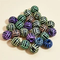 Colorful striped volleyball beads set in green, purple, orange, blue, and yellow patterns - 12mm Volleyball Black Background Colorful Line