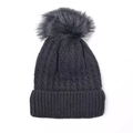 Women's black cable knit beanie with a large faux fur pompom and ribbed cuff - Black