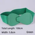 Women's 5.8cm wide green elastic waist belt with textured faux leather bow buckle - 100cm Extended / Green