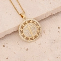 Macro shot of 18K gold plated cross pendant with micro-pave cubic zirconia crystals - Round Medallion Micro Texture Cross Style (8#)