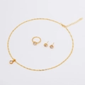 Detailed view of golden jewelry set featuring clear round zircon stones and water wave chain - Gold