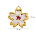 Macro view of a 13x14mm cherry blossom pendant with white shell and pink gemstone - Rose Red Zirconia