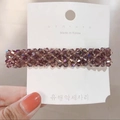 Detail of handmade lavender crystal beaded hair clip with silver metal base and glossy finish - Purple