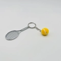 Tennis racket and yellow ball keychain with silver metal chain on white background - 4.8cm*3.8cm / Metal Tennis Keychain Yellow