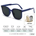 Foldable kids dark blue sunglasses with grey lenses and a white round storage case - Blue Frame Black Grey Lens + Box