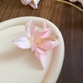 Close-up of pink silk hibiscus flower hair clip with layered petals on a neutral tray - Light Pink
