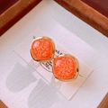 Macro detail of vintage square orange faux stone earrings with elegant gold metallic borders - No.35 925 Silver Needle Gold Orange