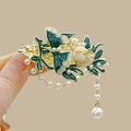 Vintage gold hair clip with green enamel leaves, white flowers, and pearl tassels - F1473 Left Side