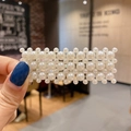 Elegant rectangular pearl hair clip with dense white pearls shown in a hand-held close-up - 20# Mixed Pearl Square Pave Clip