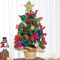Detailed view of a 60cm tabletop Christmas tree with festive ornaments and burlap base - Burlap Red Berry Set