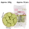 Christmas snowman and tree cookies in a 180g pack with a white ceramic bowl display - Matcha Flavor Biscuits 180g