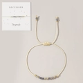 Handmade adjustable tanzanite bead bracelet for December featuring a creamy cord and gold accents - December-Tanzanite (Card Pack)