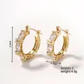 Macro view of gold-plated hoop earrings with marquise-cut cubic zirconia crystals - E03241-1 Marquise Zirconia