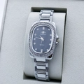 Detailed view of silver oval quartz watch with rhinestones in a gray velvet gift box - Silver Black