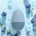 Detailed view of a blue egg-shaped facial ice roller with textured surface and flowers - New Egg Shape - Blue