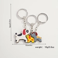 Detailed view of dog family puzzle keychain with size 10x9cm and weight 16g labels - Dalmatian Family of Three