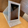 Detail view of foldable makeup mirror with colorful rhinestones and white PU leather base - White Rhinestone