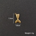 Macro view of gold fishtail pendant showing dimensions 1.5cm by 0.8cm and 1.2g weight - Large Mermaid Tail