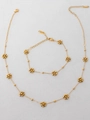 Detail of gold-plated stainless steel necklace and bracelet set with bead flower charms - Gold Bead Necklace And Bracelet