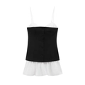 Detalle de camisola de patchwork en blanco y negro con botones frontales y bajo volado - XS / Negro y Blanco