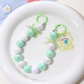 Detalle del llavero de cuentas de sirena coloridas con lazo y colgante de oso adorable - Degradado Verde Blanco-Oso