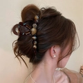Amber textured shark hair clip with bead accents worn on a model's hair - Amber with Rhinestone / Amber