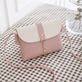 Mini crossbody bag for women in pink and beige PU leather with golden deer charm - Pink