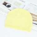 Pale yellow knit beanie hat with ribbed cuff on a minimalist white background - Neon Yellow