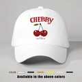 Adjustable white cotton baseball cap featuring red cherry print and happy slogan graphic - One Size / White