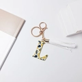 Letter L keychain with navy palm leaf floral pattern and long white tassel detail - Letter L (With Tassel)