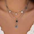 Detail of layered silver necklace featuring a black drop gem and vintage coin pendant - Silver Vintage Coin Teardrop Style (09 White K)