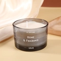 Candela profumata in vetro grigio traslucido su seta con scritte decorative home - Nero